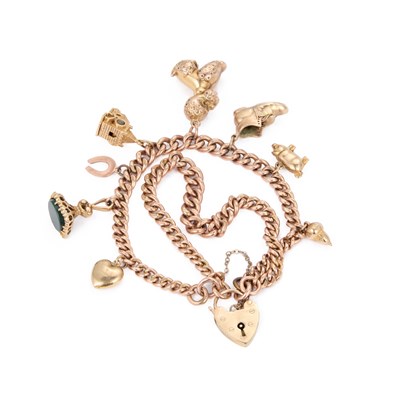 Lot 473 - A CHARM BRACELET