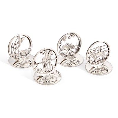 Lot 234 - A SET OF FOUR GEORGE V SILVER MENU HOLDERS