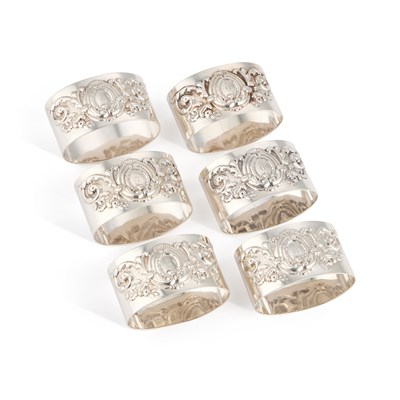 Lot 304 - A SET OF SIX LATE VICTORIAN SILVER NAPKIN RINGS