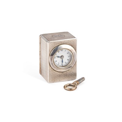 Lot 228 - A GEORGE V ENGINE-TURNED SILVER MINIATURE CARRIAGE CLOCK