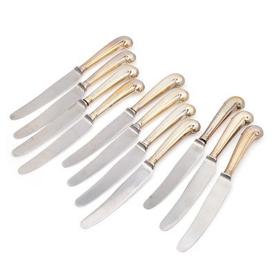 Lot 309 - A SET OF TEN VICTORIAN SILVER PISTOL-HANDLED DESSERT KNIVES