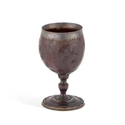 Lot 358 - A GEORGIAN SILVER-MOUNTED COCONUT CUP