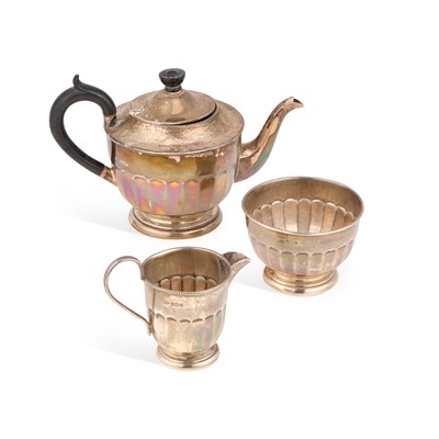 Lot 229 - A GEORGE V SILVER THREE-PIECE TEA SERVICE
