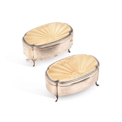 Lot 219 - A PAIR OF GEORGE V SILVER AND ENAMEL JEWELLERY BOXES