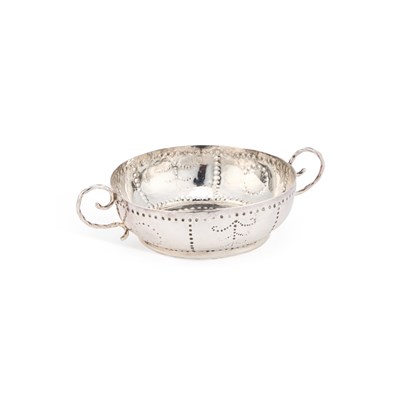 Lot 405 - A CHARLES II SILVER TASTEVIN