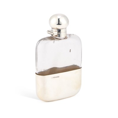Lot 238 - A GEORGE V SILVER-MOUNTED GLASS SPIRIT FLASK