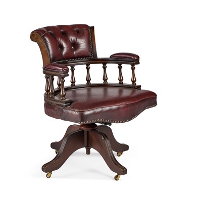 Lot 653 - A LEATHER UPHOLSTERED SWIVEL DESK CHAIR