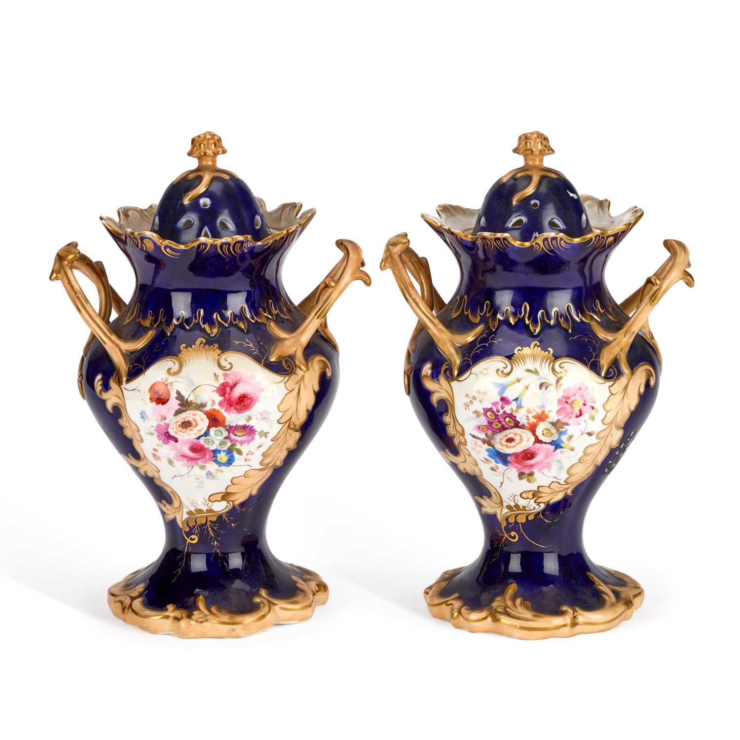 Lot A PAIR OF STAFFORDSHIRE POTPOURRI VASES AND COVERS