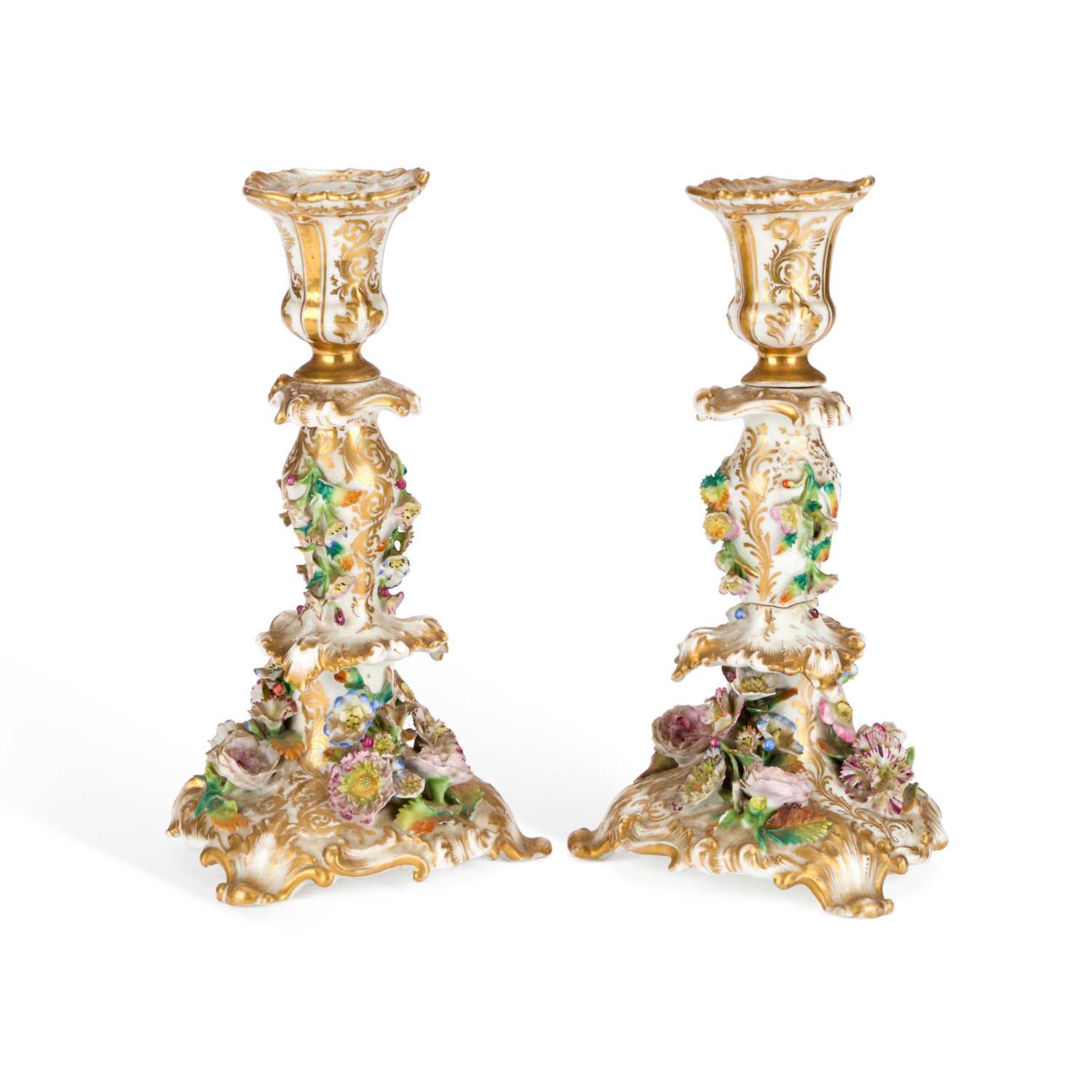 Lot A PAIR OF JACOB PETIT FLORAL-ENCRUSTED PORCELAIN CANDLESTICKS