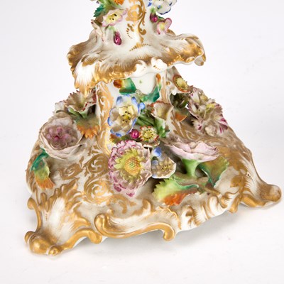 Lot A PAIR OF JACOB PETIT FLORAL-ENCRUSTED PORCELAIN CANDLESTICKS