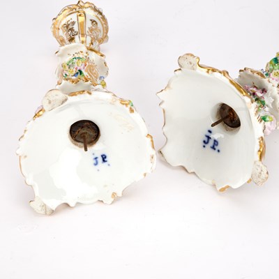 Lot A PAIR OF JACOB PETIT FLORAL-ENCRUSTED PORCELAIN CANDLESTICKS