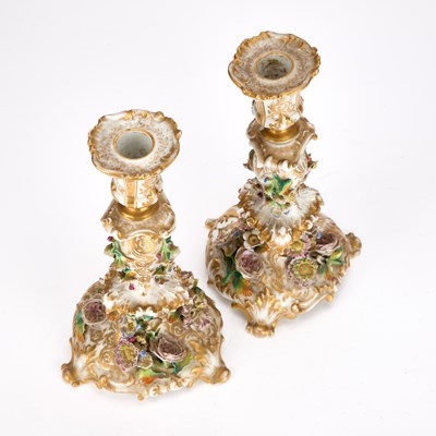 Lot A PAIR OF JACOB PETIT FLORAL-ENCRUSTED PORCELAIN CANDLESTICKS