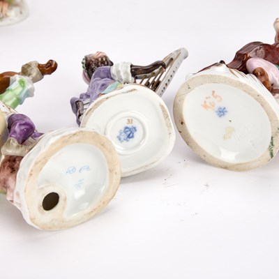 Lot A COLLECTION OF TWELVE GERMAN PORCELAIN MONKEY BAND FIGURES