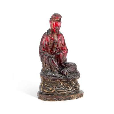 Lot A CHINESE FAUX AMBER FIGURE OF BUDDHA