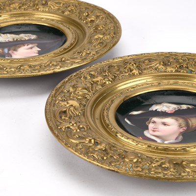 Lot A PAIR OF CONTINENTAL BRASS-FRAMED PORCELAIN PLAQUES