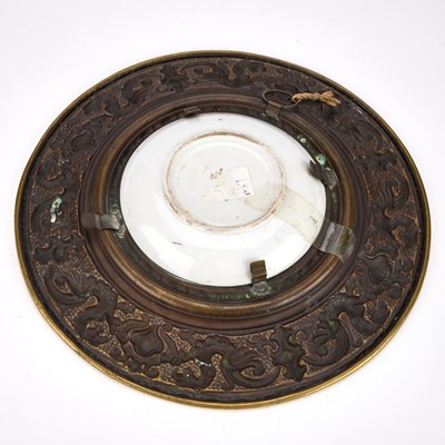 Lot A PAIR OF CONTINENTAL BRASS-FRAMED PORCELAIN PLAQUES