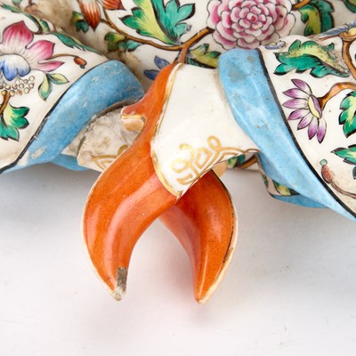 Lot 87 - A 19TH CENTURY CONTINENTAL PORCELAIN PAGODA FIGURE BASE