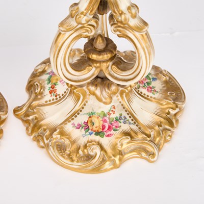 Lot A PAIR OF ENGLISH PORCELAIN CANDLESTICKS