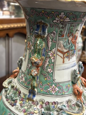 Lot 134 - A LARGE PAIR OF CHINESE TURQUOISE-GROUND FAMILLE ROSE ENAMELLED VASES