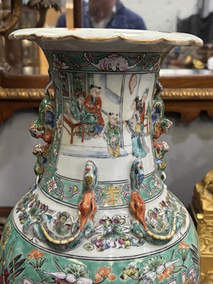 Lot 134 - A LARGE PAIR OF CHINESE TURQUOISE-GROUND FAMILLE ROSE ENAMELLED VASES