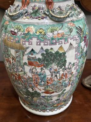 Lot 134 - A LARGE PAIR OF CHINESE TURQUOISE-GROUND FAMILLE ROSE ENAMELLED VASES