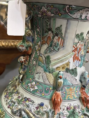 Lot 134 - A LARGE PAIR OF CHINESE TURQUOISE-GROUND FAMILLE ROSE ENAMELLED VASES