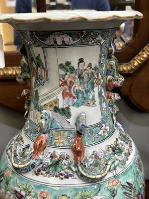 Lot 134 - A LARGE PAIR OF CHINESE TURQUOISE-GROUND FAMILLE ROSE ENAMELLED VASES