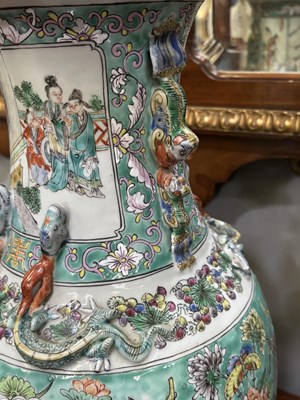Lot 134 - A LARGE PAIR OF CHINESE TURQUOISE-GROUND FAMILLE ROSE ENAMELLED VASES