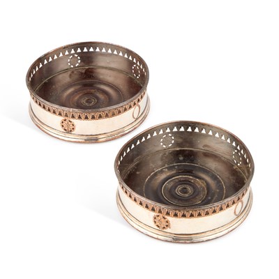 Lot 106 - A PAIR OF GEORGE III OLD SHEFFIELD PLATE WINE COASTERS
