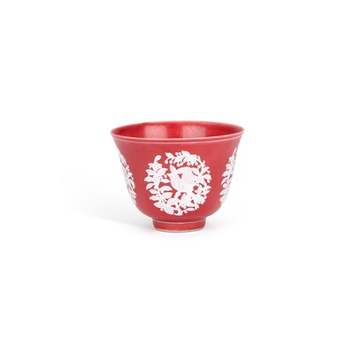 Lot 46 - A CHINESE RED-GROUND PORCELAIN CUP
