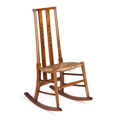 Lot 696 - AN ARTS AND CRAFTS INLAID STAINED BEECH ROCKING CHAIR