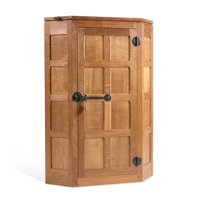 Lot 733 - ROBERT THOMPSON OF KILBURN, A MOUSEMAN OAK HANGING CORNER CABINET