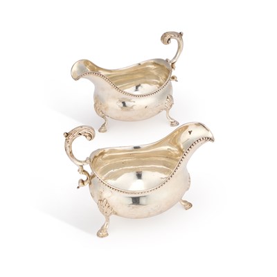 Lot 373 - A PAIR OF GEORGE III SILVER SAUCEBOATS