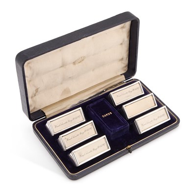 Lot 161 - A SET OF SIX EDWARDIAN SILVER NAPKIN RINGS