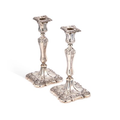 Lot 246 - A PAIR OF EDWARDIAN SILVER CANDLESTICKS