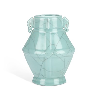 Lot 57 - A CHINESE CELADON-GLAZED TWO-HANDLED VASE