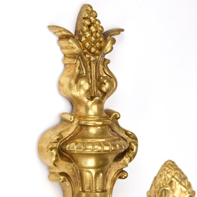 Lot A GOOD SET OF FOUR GILT-BRONZE THREE-LIGHT WALL SCONCES