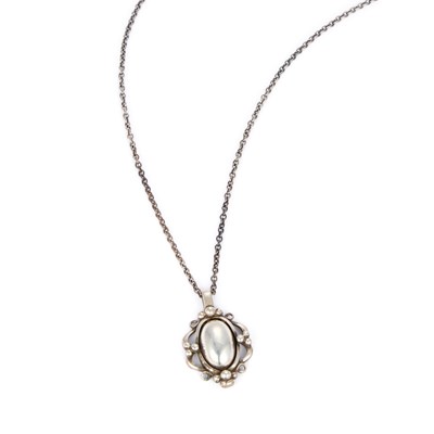 Lot 642 - GEORG JENSEN, A DANISH SILVER 1989 PENDANT OF THE YEAR ON CHAIN