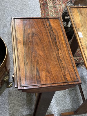 Lot 1037 - A SET OF THREE GEORGE IV ROSEWOOD PILLAR-END NESTING TABLES