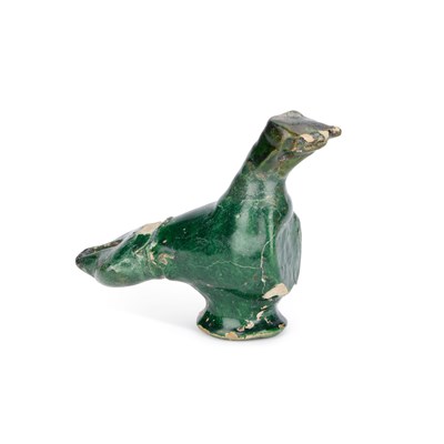 Lot 80 - AN EARLY GREEN-GLAZED POTTERY MODEL OF A BIRD