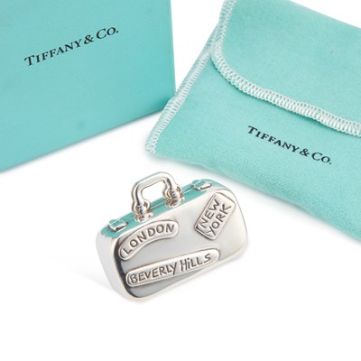 Lot 325 - TIFFANY & CO, A SILVER SUITCASE PILL BOX