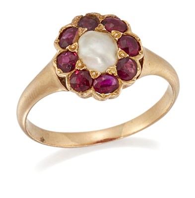 Lot 1618 - A SPLIT PEARL AND RUBY CLUSTER RING