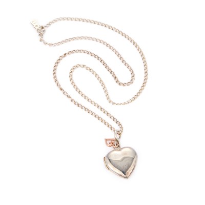 Lot 633 - CLOGAU, A SILVER LOCKET PENDANT ON CHAIN