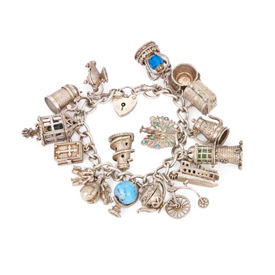 Lot 637 - A CHARM BRACELET