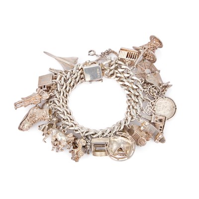 Lot 674 - A SILVER CHARM BRACELET