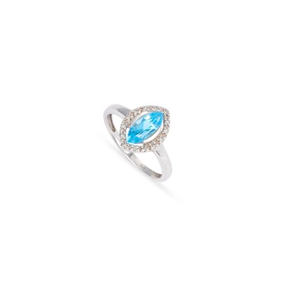 Lot 657 - A 9 CARAT WHITE GOLD BLUE TOPAZ AND DIAMOND HALO RING