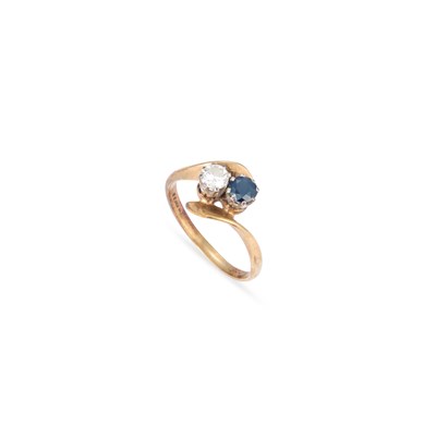 Lot 613 - A 9 CARAT GOLD DIAMOND AND SAPPHIRE TOI ET MOI RING