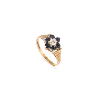 Lot 685 - A 9 CARAT GOLD SAPPHIRE AND DIAMOND RING