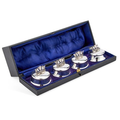 Lot 429 - A SET OF FOUR EDWARDIAN SILVER MENU HOLDERS