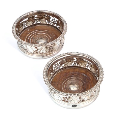 Lot 434 - A PAIR OF GEORGE IV SILVER WINE COASTERS
